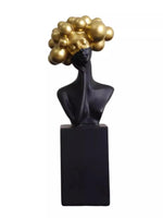 statuette décorative buste féminin noir blanc bleu or moderne minimaliste.surface lisse polie.formes arrondies socle