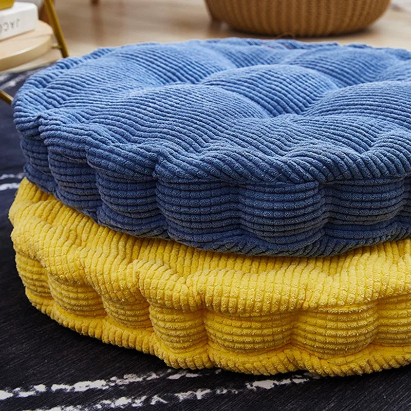 Coussin rond dans différentes couleurs disponibles chez Ombre Intérieur