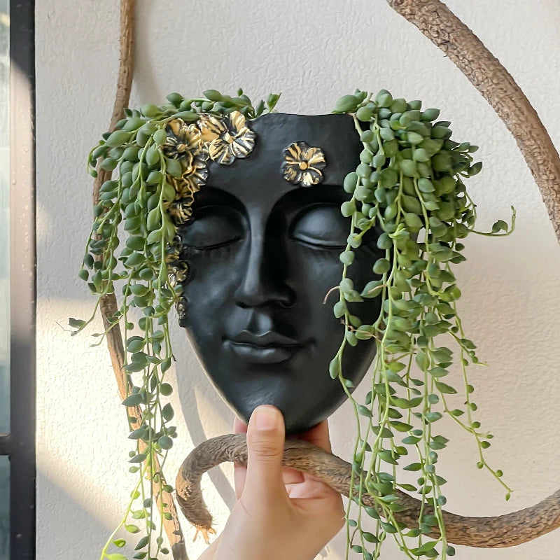 décoration murale résine sculpturale masque noir motif floral doré plante verte fixations