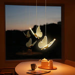 suspension lumineuse moderne or papillon translucide salon chambre étude hall double têtes