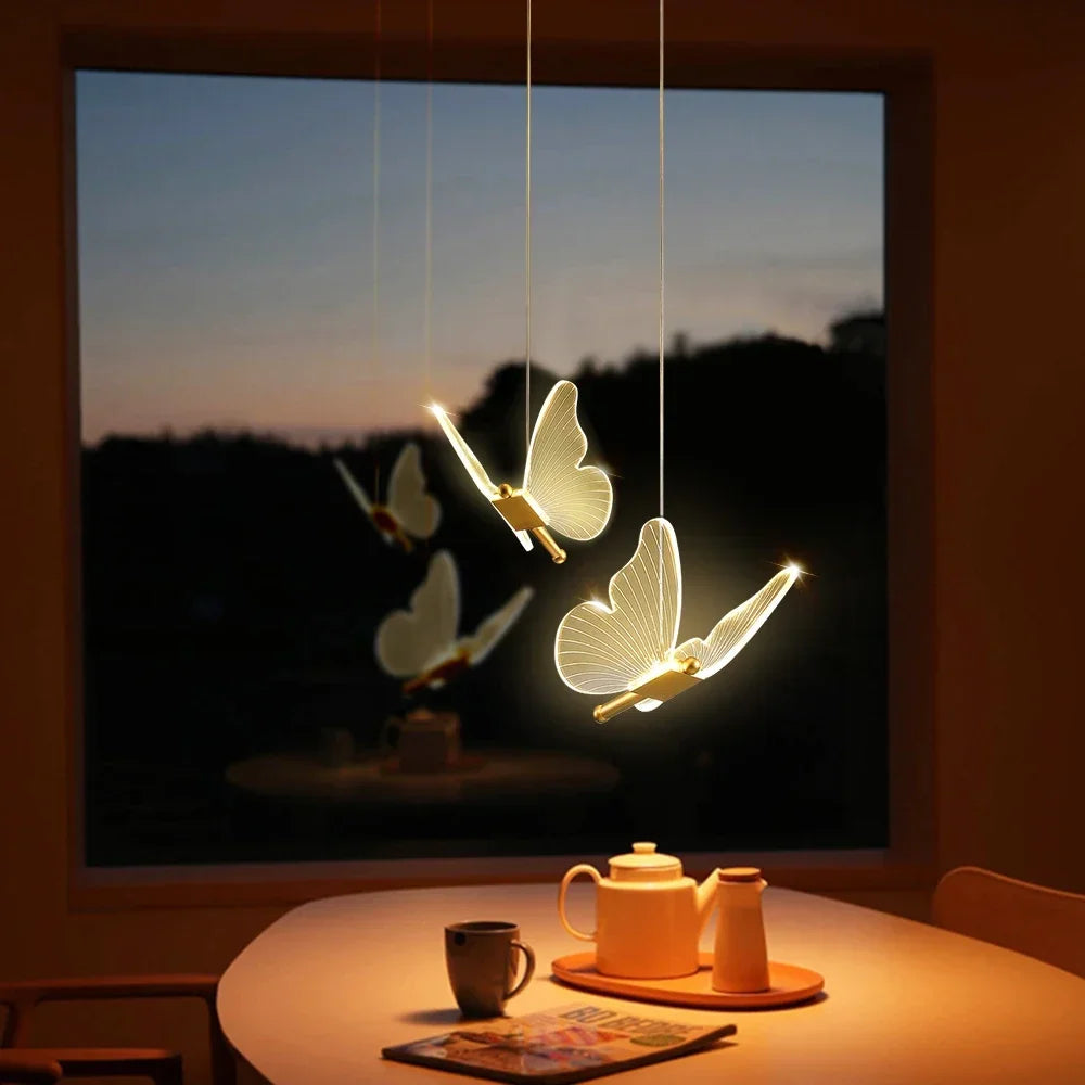 suspension lumineuse moderne or papillon translucide salon chambre étude hall double têtes