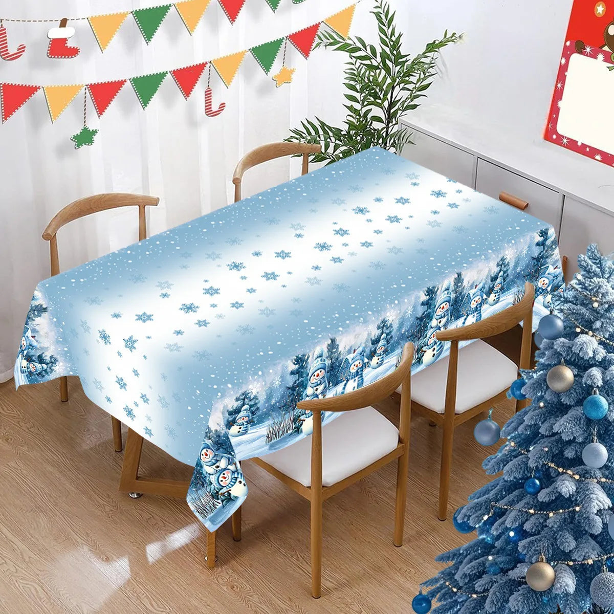 nappe hiver noel bonhommes neige flocons arbre decorations guirlandes cadeaux bougies festive table
