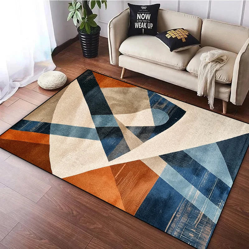 Ce tapis géométrique multicolore aux teintes beige, bleues et oranges apporte une touche moderne et élégante au salon.