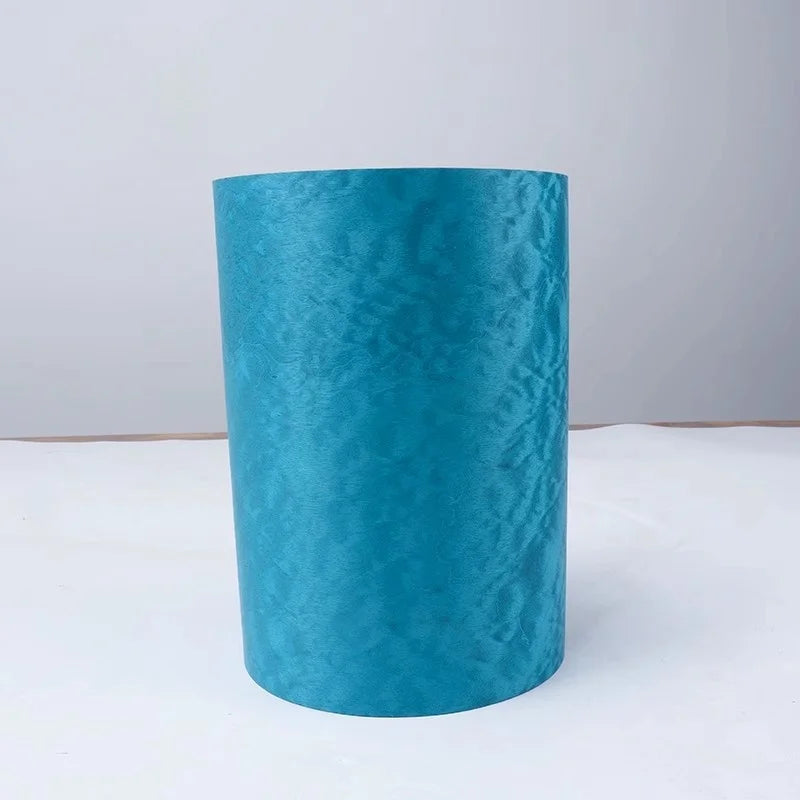 rouleau bois texturé bleu turquoise décoratif artisanal souple craquelé main gantée orange manipulation facile