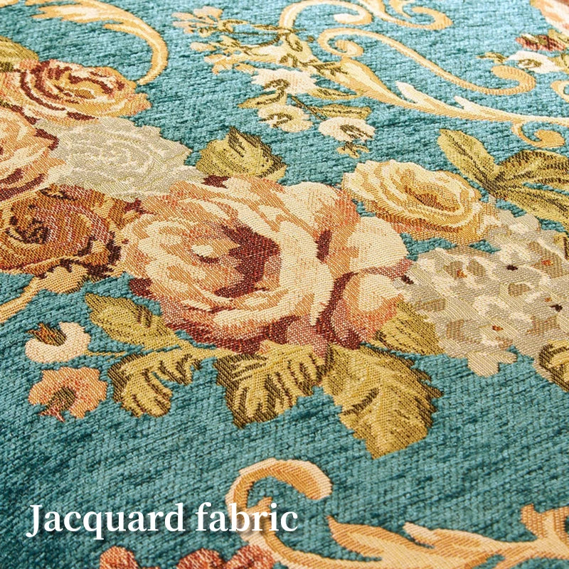 Tissus jacquard aux motifs floraux et ornementaux en couleurs chaudes sur un fond turquoise.