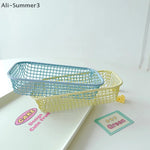 paniers rangement blanc bleu rose jaune maille fine moderne minimaliste sans fixation papeterie
