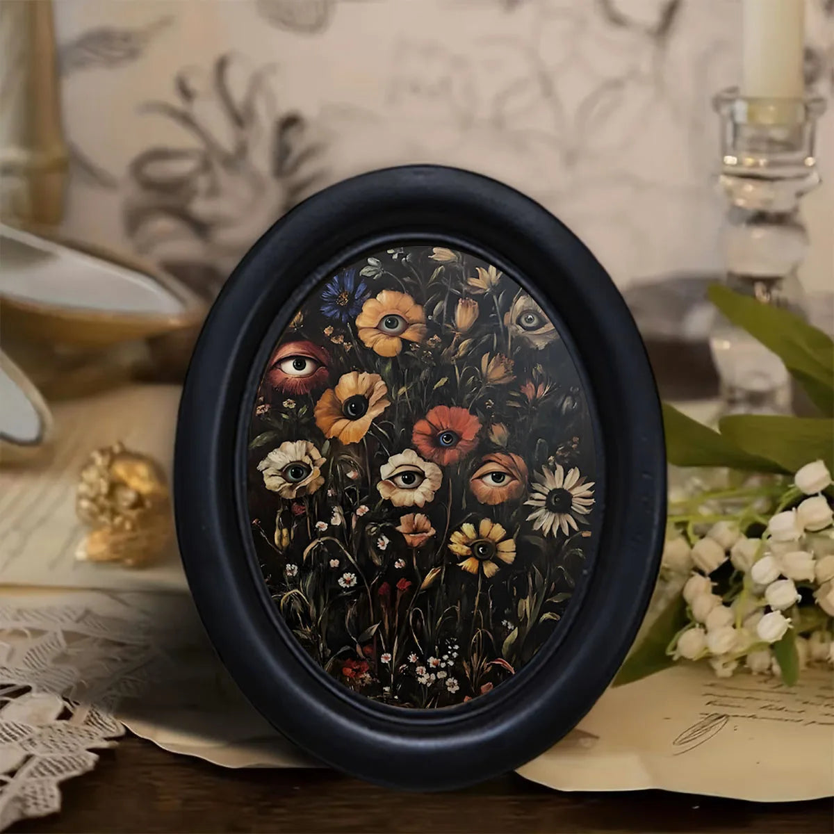cadre photo ovale noir fleurs yeux stylisés classique decor mural gothique surréaliste erotique erotique