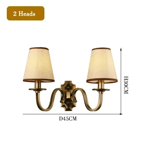 chandelier bronze classique suspension lumière abat jours tissu texturé courbes salle manger