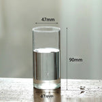 vase verre transparent moderne base bois fleurs artificielles inclusion chambre