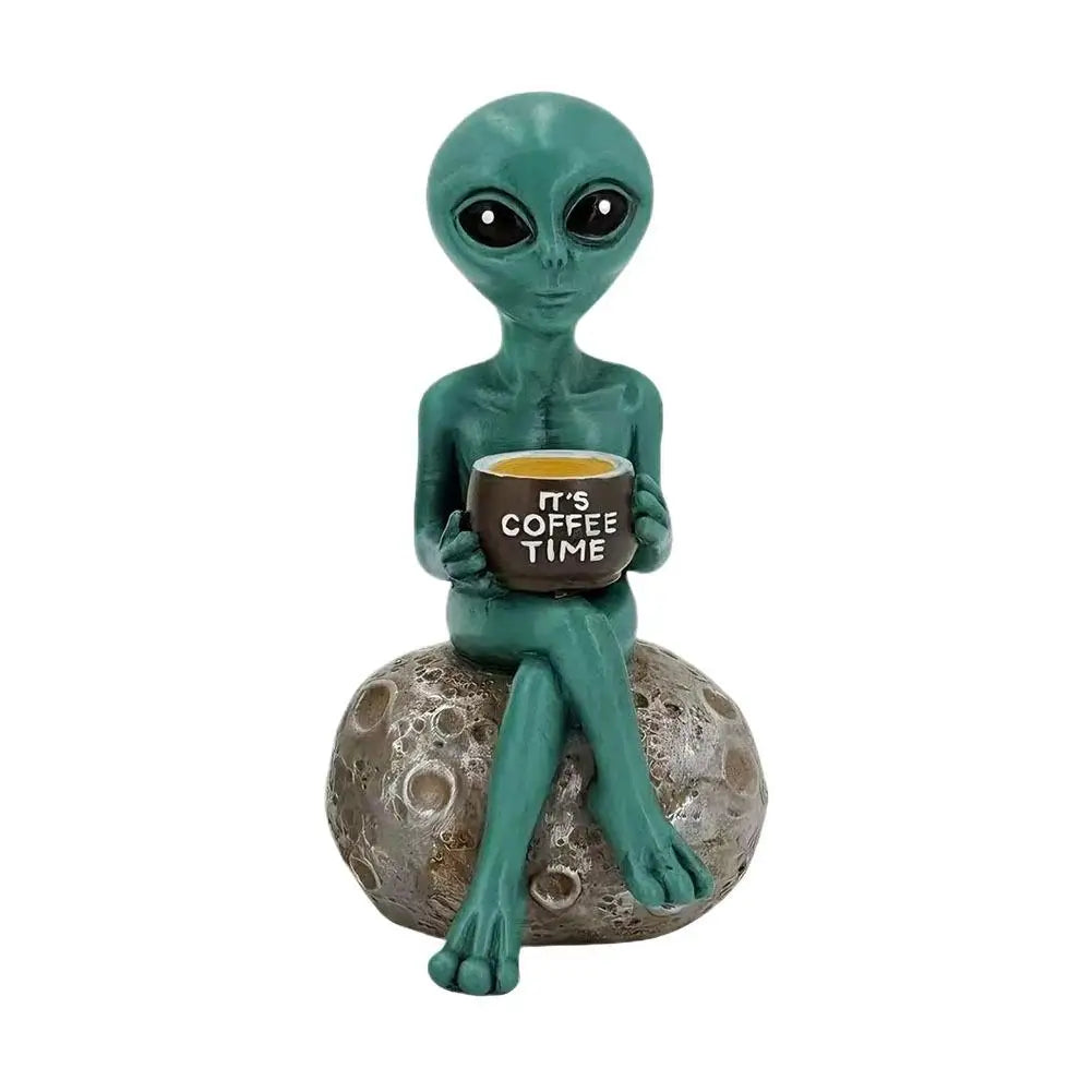 statuette alien humoristique lisant livre décoration jardin vert gris ornement artistique externe