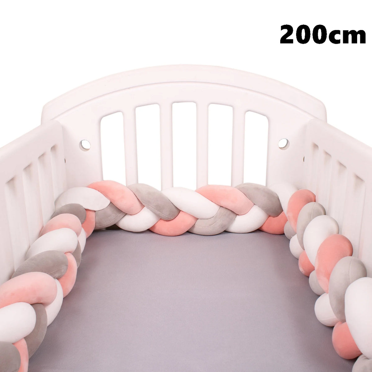 coussin noué bébé tissu doux texture tressée beige clair moderne confortable sécurité chambre anti