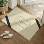 tapis moderne logo jo malone londres beige clair noir bordure diagonale résistant décoloration polyester