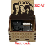 boîte musicale bois naturel motifs floraux 18 tons vintage manivelle horlogerie artisanale