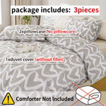 ensemble literie housse couette deux taies d'oreiller coeur gris blanc moderne