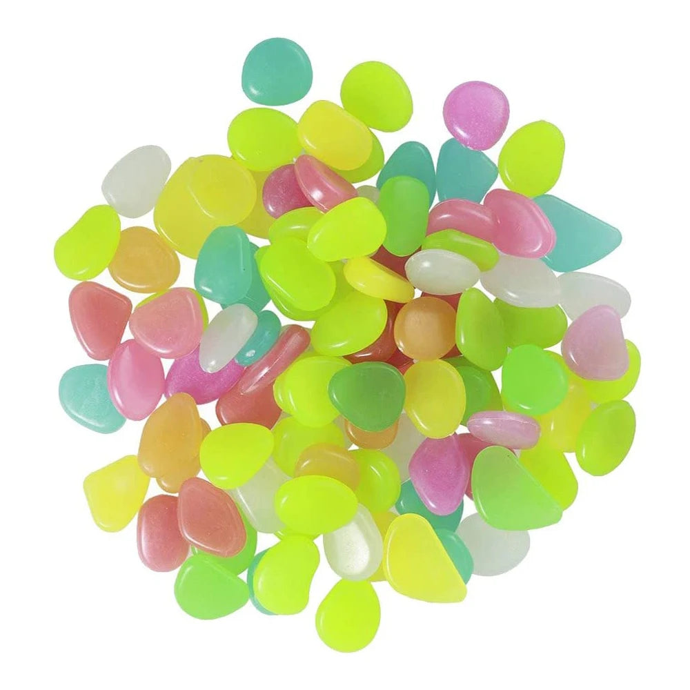 pierres fluorescentes bleu vert jaune rose modernes lisses jardin patio décor lumineux