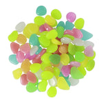 pierres fluorescentes bleu vert jaune rose modernes lisses jardin patio décor lumineux