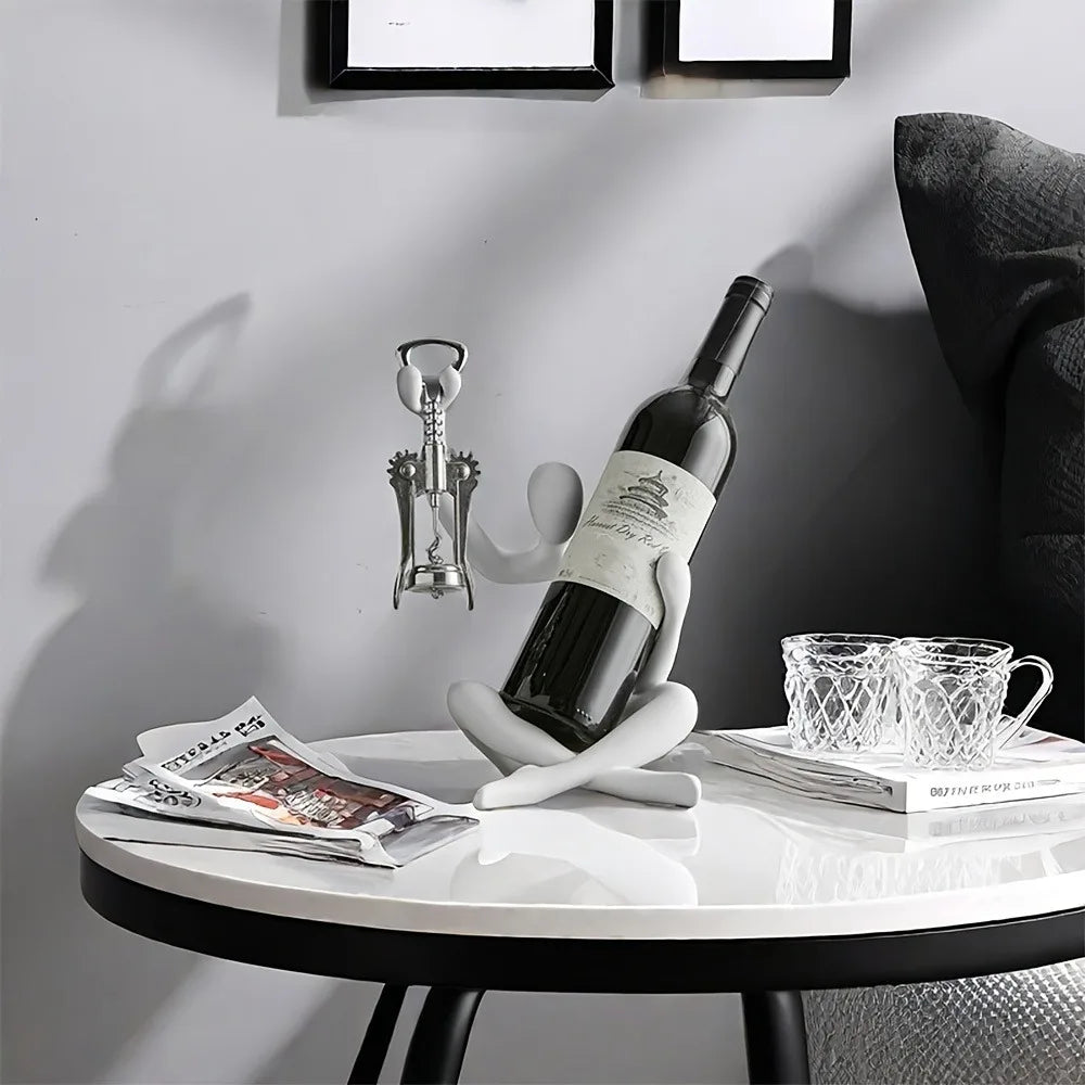 support bouteille ornement sculptural humain assis contemporain or noir blanc résine