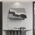 cadre mural contemporain noir montagne relief lignes lumineuses minimaliste fixations murales decoration interieur