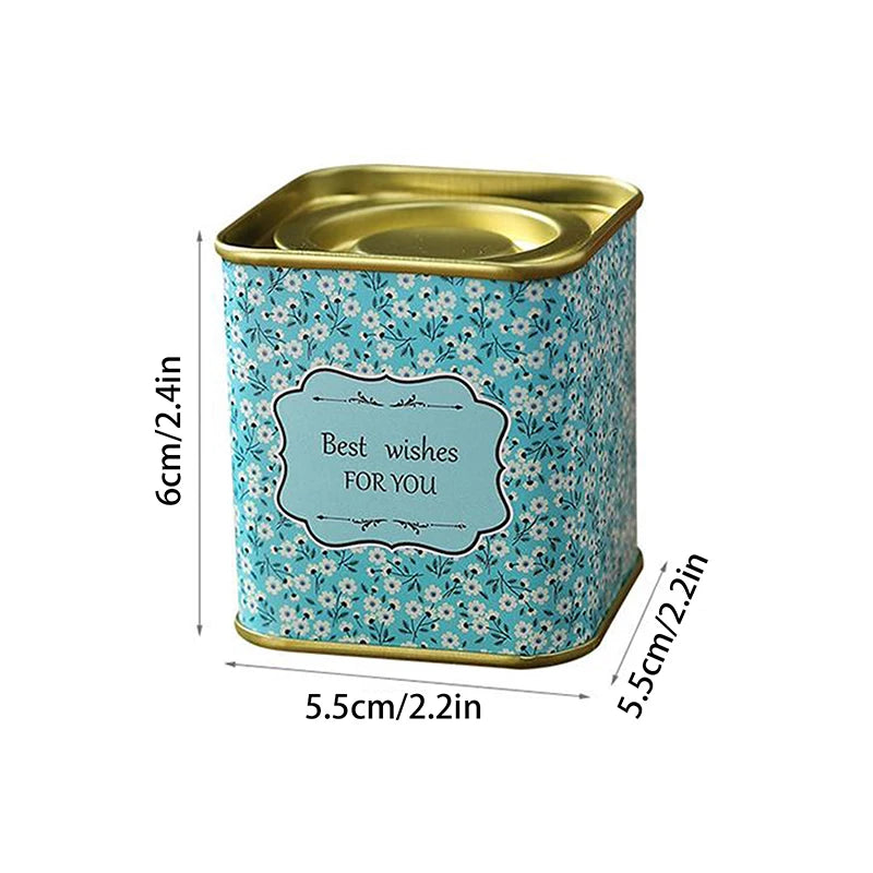 boîtes métal bleu rose noir fleurs vintage capsules étiquettes messages conservation snacks thé