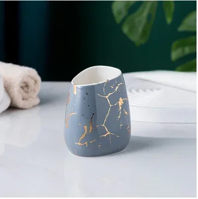 ensemble salle bain moderne marbre doré blanc distributeur savon porte brosse dents tasses plateaux