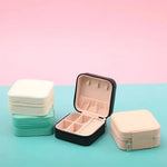 boîte bijoux cuir pu noir rose blanche bleue moderne compact glissière rangement bijoux