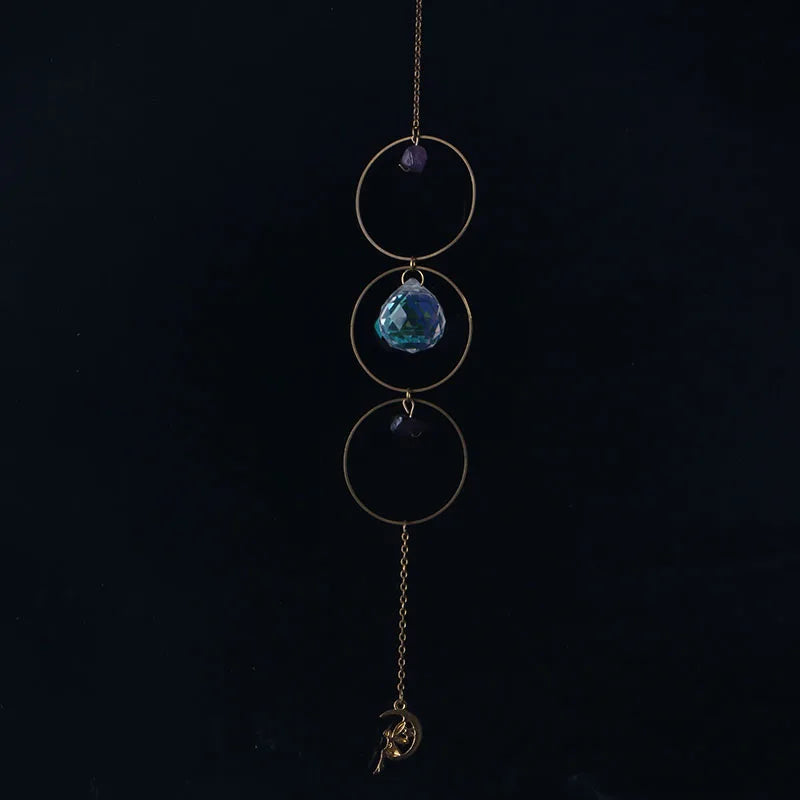 bijou pendentif cristal or bleu violet vert formes géométriques motifs oculaires translucides boho chic