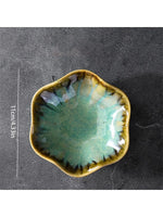 assiettes bijoux rose bleu vert rayures concentriques bordure dorée moderne élégantes rangement exposition