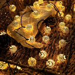 guirlande lumineuse solaire or noir 50 led modes moderne perforée géométrique festive extérieure