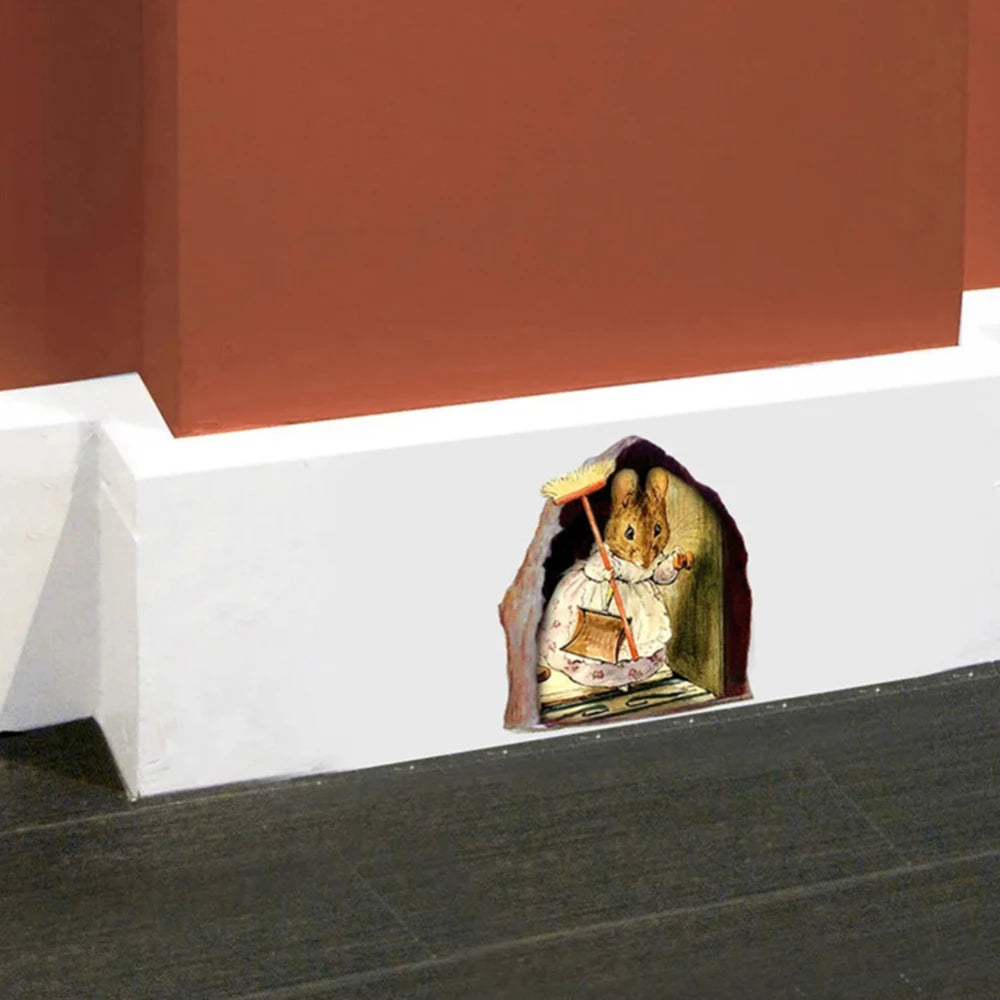 Détail du sticker mural 3D souris dans un trou montrant l'effet réaliste