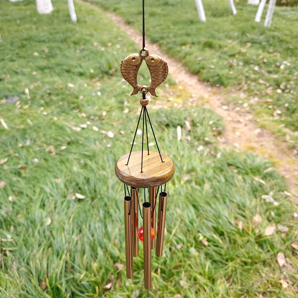 cloches vent clochette artisanale bronze papillons poissons suspendus décor intérieurextérieur ornement métallique plateau bois