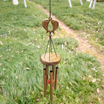 cloches vent clochette artisanale bronze papillons poissons suspendus décor intérieurextérieur ornement métallique plateau bois