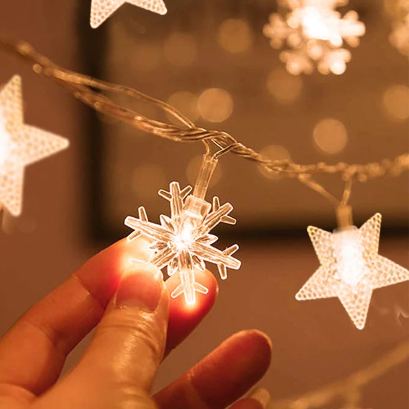 guirlande lumineuse noël étoiles flocons neige rennes ange blanc doré festive clips
