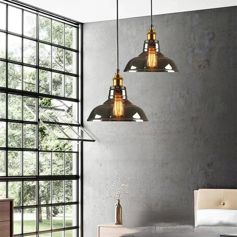 suspension lumineuse industrielle vintage ampoule filament verre transparent noir salon restaurant bar