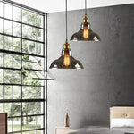 suspension lumineuse industrielle vintage ampoule filament verre transparent noir salon restaurant bar