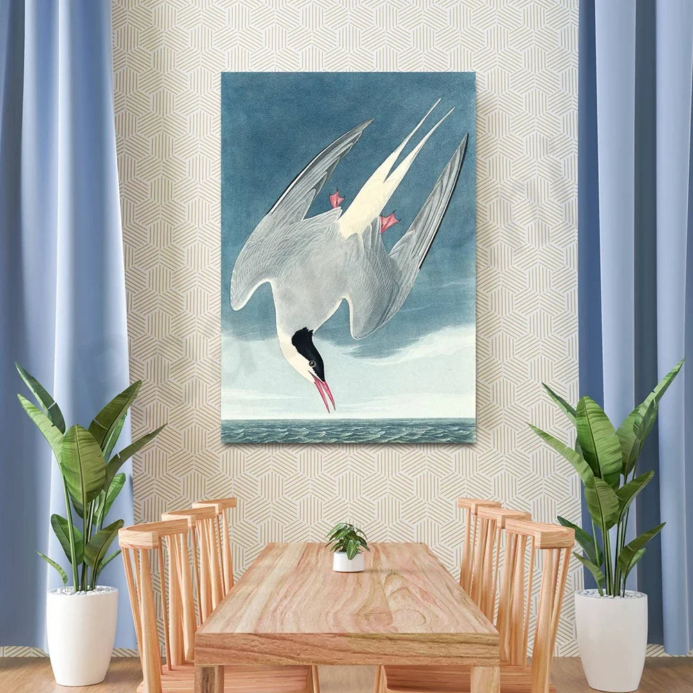 Une toile murale présentant un élégant oiseau blanc en vol sur un fond bleu océanique, créant une ambiance sereine et apaisante dans cet espace de vie.