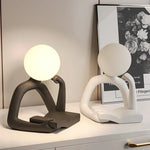 décoration moderne sculpture résine LED noir blanc lisse minimaliste table chambre