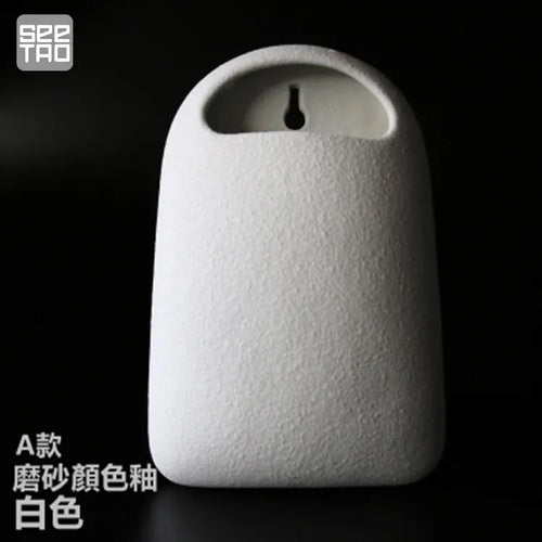 Cache pot suspendu moderne beige gris noir lisse décoration murale vase fleuri minimaliste