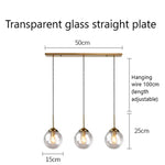 suspension lumineuse transparente moderne ampoule brillante câble noir minimaliste chambre salon étude