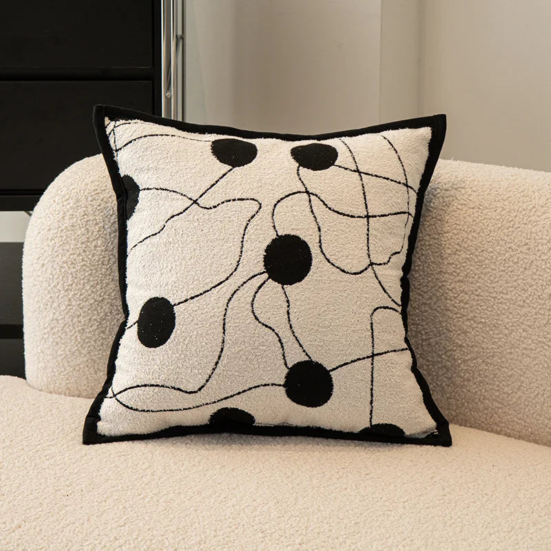 taies d'oreiller décoratives noires blanches motif fleur jacquard respectueuses environnement polyester modernes maison hospitalière