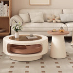 table basse moderne verre transparent plateau rotatif compartiment trois sections couleur beige marron clair