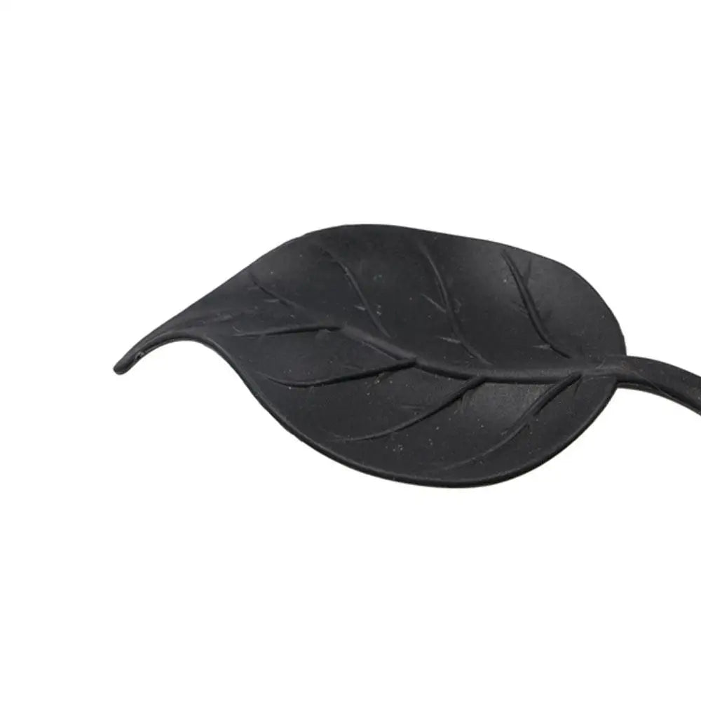support lampe métal noir motif feuille artisanal base lampe