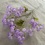 bouquet artificiel violet feuilles vertes décoration extérieure anniversaire mariage minimaliste