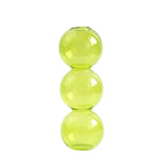 vases transparents modernes sphères empilées bleu vert marron beige