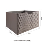 boîte rangement cuir matelassé poignées métalliques chambre moderne