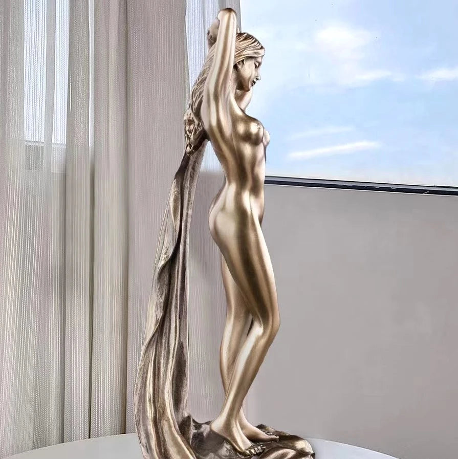 statue femme nue résine bronze détails musculaires drapé tissu classique art antique livres fleurs