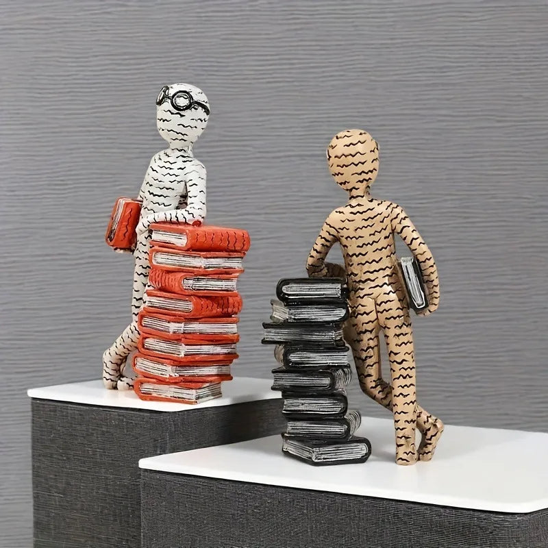 figurines decoratives modernes personnages lisant livres piles livres beige blanc orange minimaliste