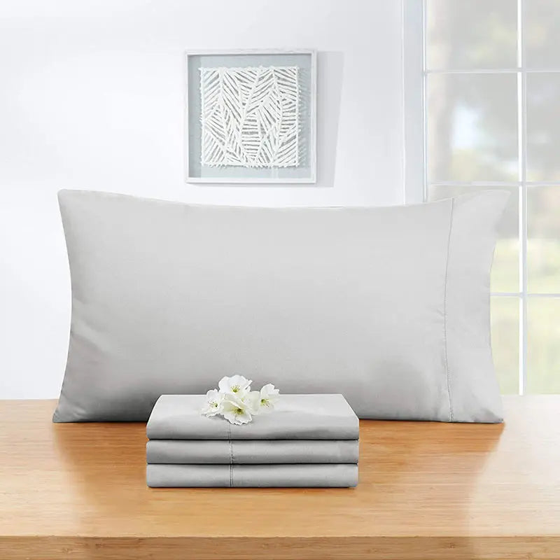 taies d'oreiller gris uni respectueux environnement coton polyester qualité moderne house