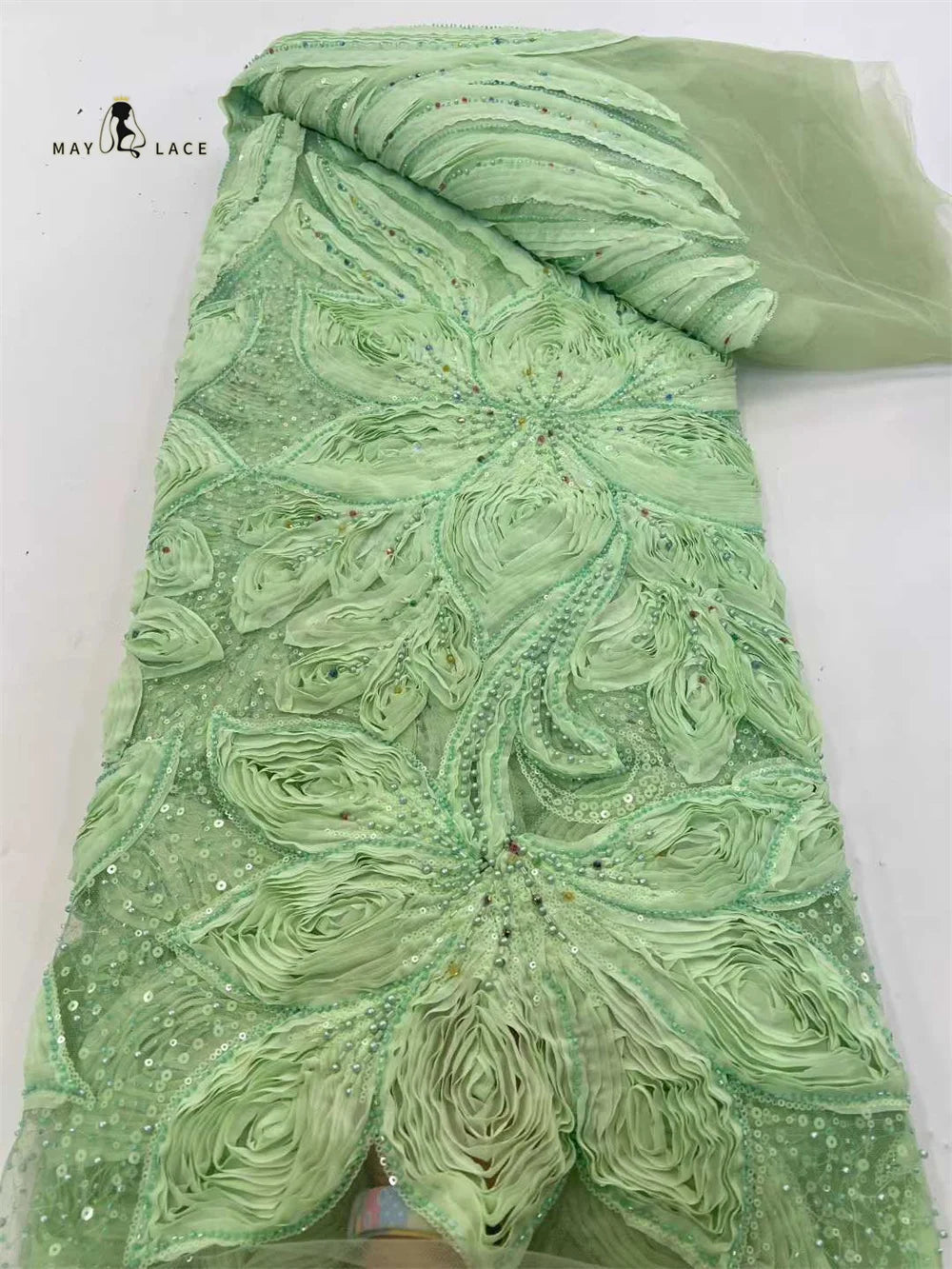 dentelle africaine brodée fleurs sequins bleu blanc vert orange translucide mariage