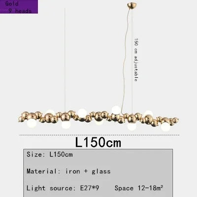 suspension lumineuse moderne doré blanc boules métalliques sphères translucides câble fixé nordique éclairage intérieur