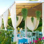 guirlande suspendue fleurs artificielles violet vert jaune moderne décorative extérieure exposition festive prénuptiale mariage